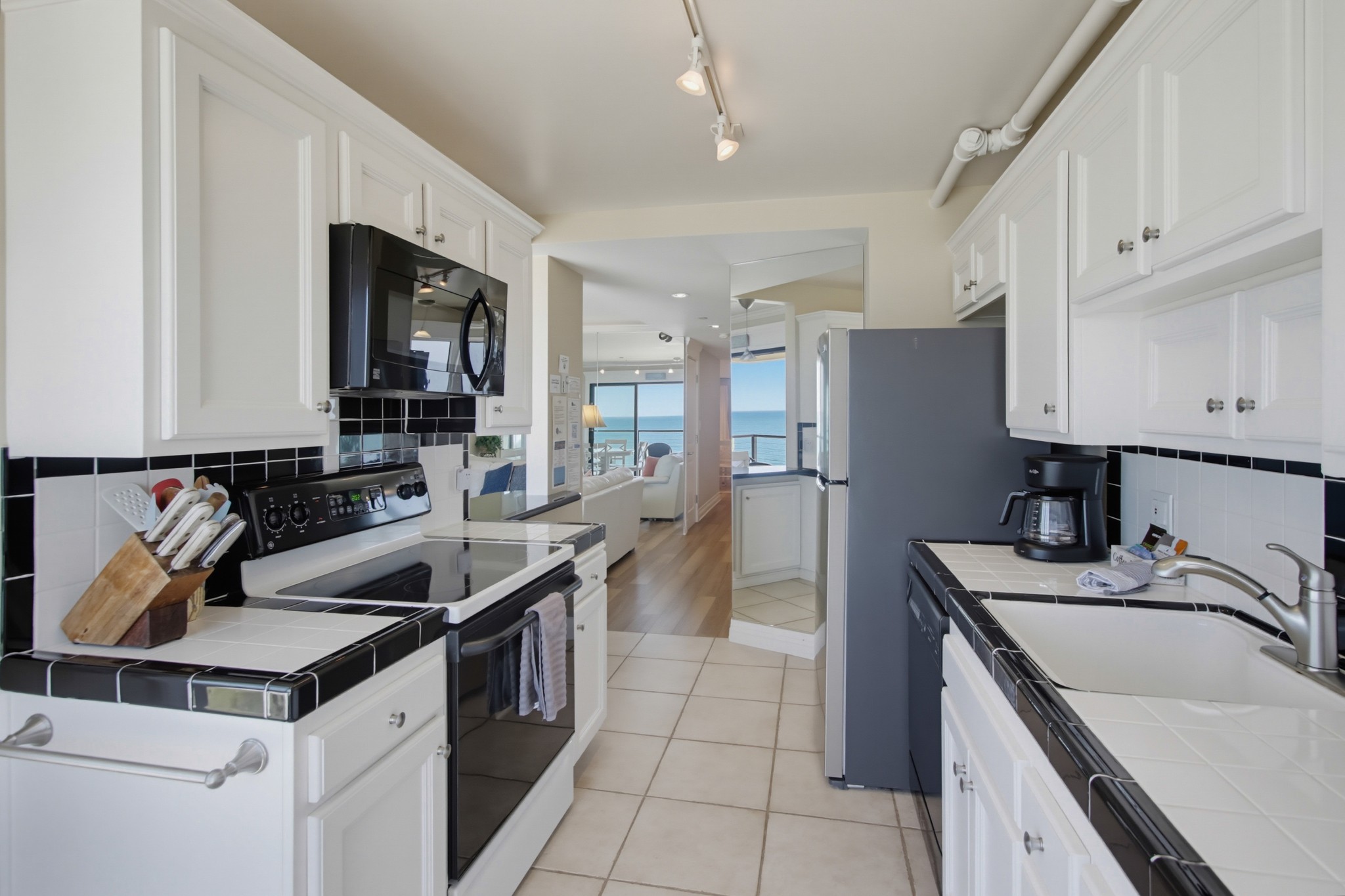 Virtual tour photo 20 of 87 for 457 Coast S Blvd Unit 302